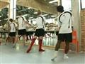 Jogadores de futebol no balé 